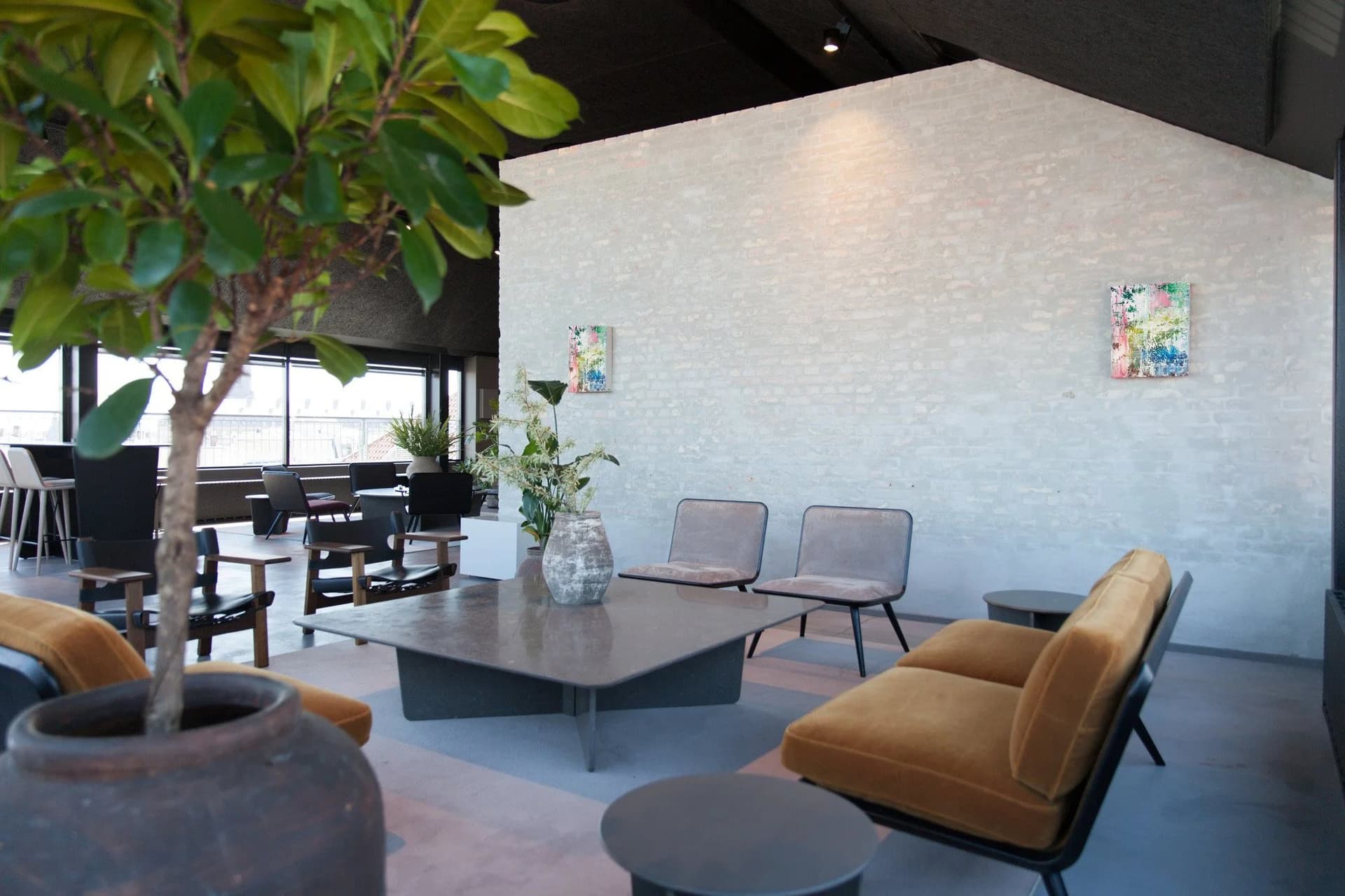Artcoustic speakers displayed as artwork in a gallery lounge