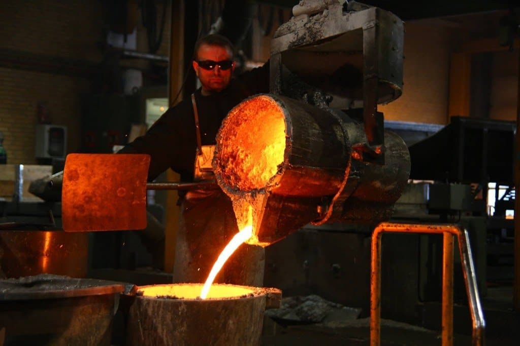 Molten iron being poured at the Danish foundry where Jern cabinets are cast